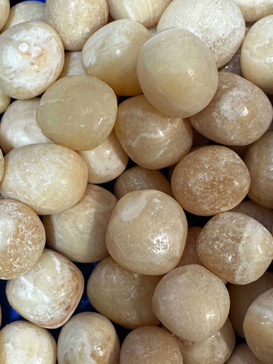 Creative Orange Calcite Tumbled Stone | Mystics Vibe